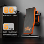 Banc de fitness orange et noir pliable, inscription sur fond sombre